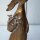 Hochwertiger stehender Osterhase aus Polyresin mit Möhrenkorb - 30cm