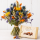 Trockenblumenstrauß mit blauen Disteln und Pralinen als Geschenkset